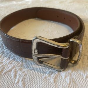 Dark brown/ gator skin look (leather?) Distressed Silver toned buckle.